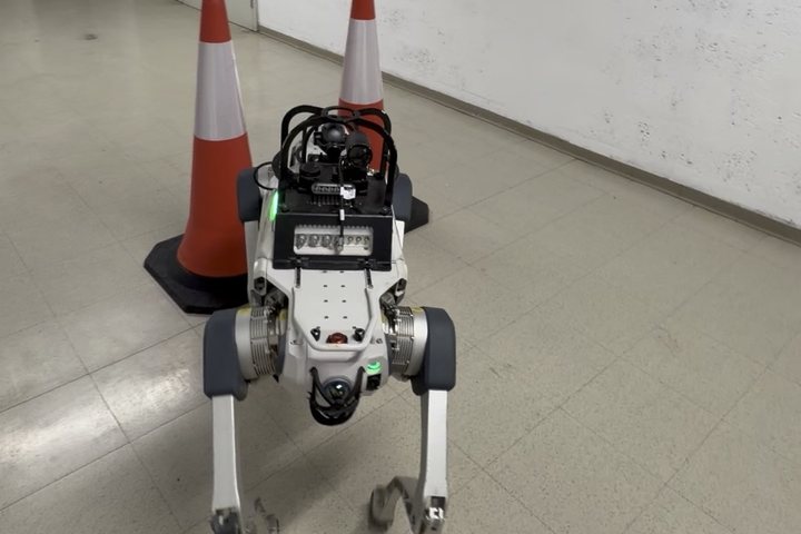Inspection robot passing traffic cones in a service corridor